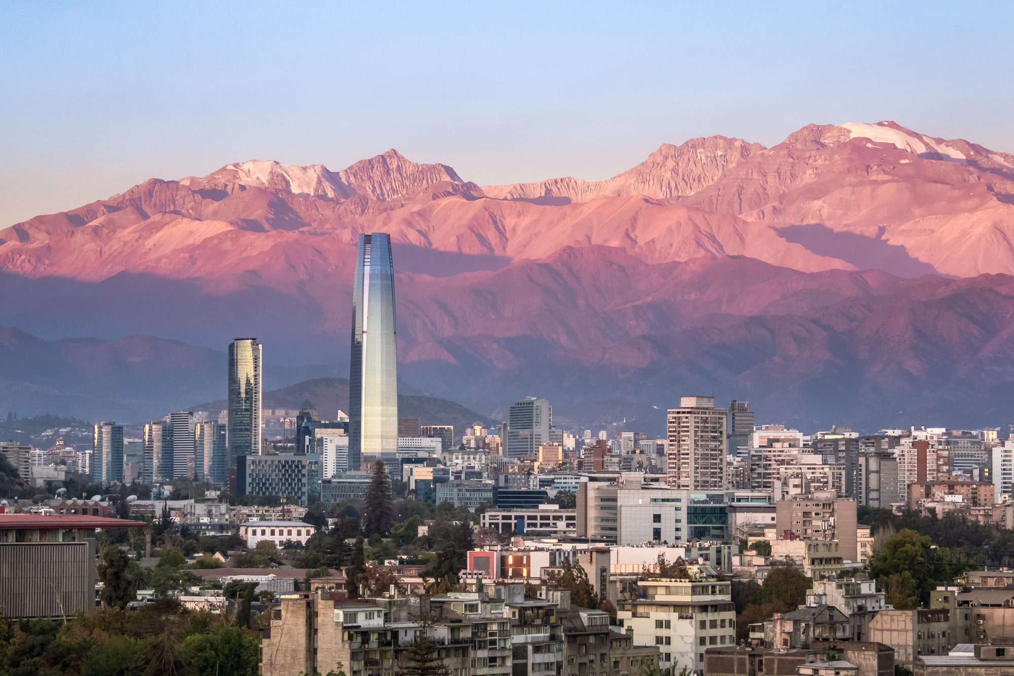 Aaerial,View,Of,Santiago,Skyline,At,Sunset,With,Costanera,Skyscraper
